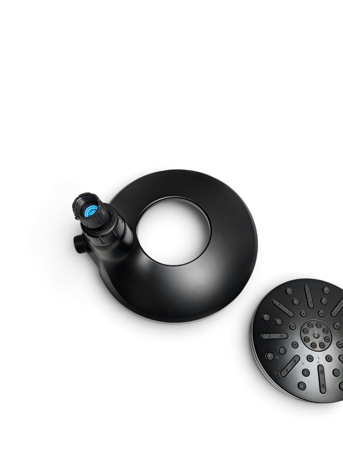 WT Outlets Delta In2ition matte black shower head components including the main housing and detachable spray face.