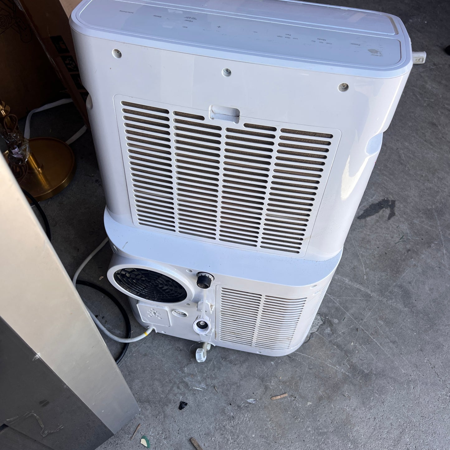 GE - 450 Sq. Ft. 10,400 BTU Portable AC (used)