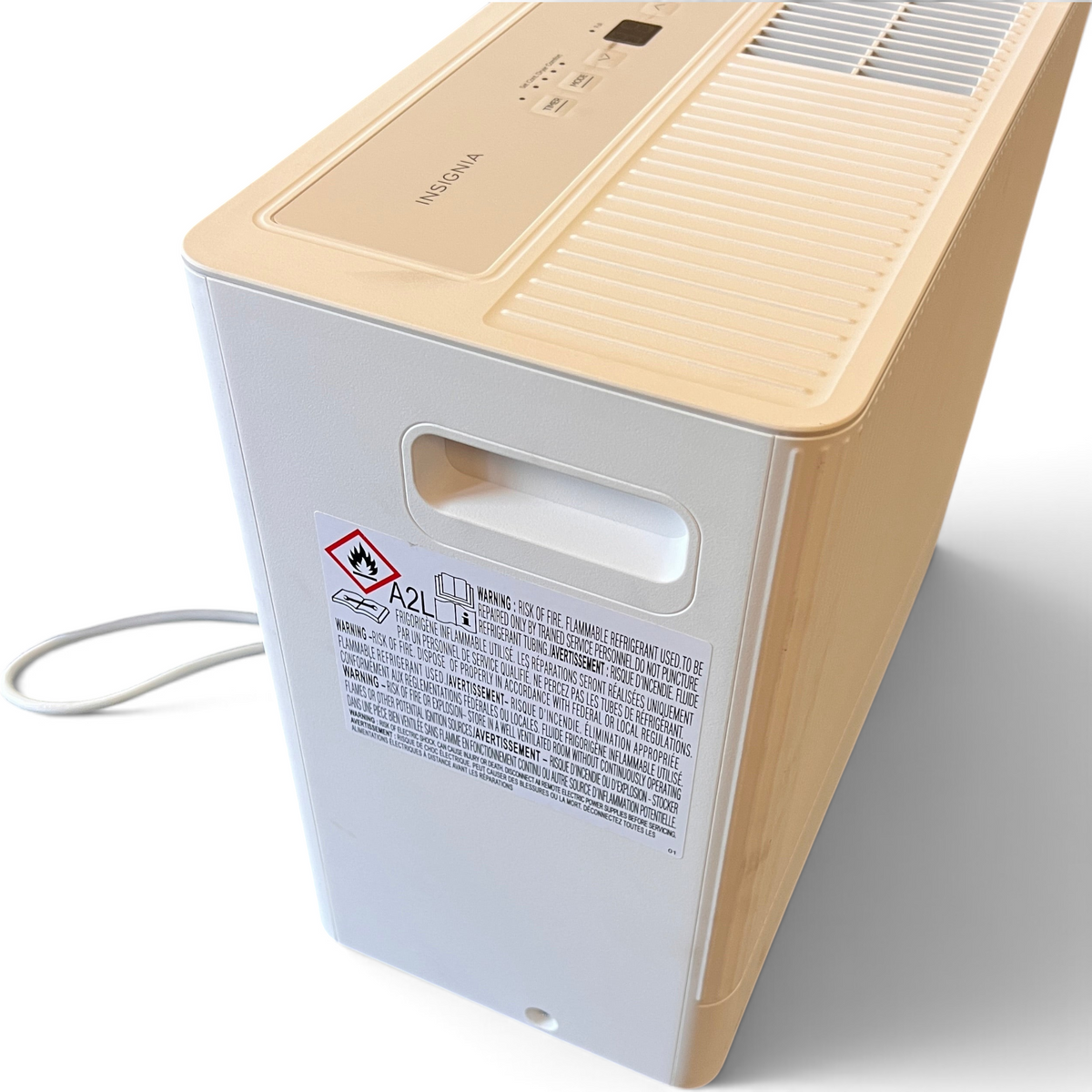 WT Outlets Insignia 35-pint portable dehumidifier in white with top control panel and warning label on side