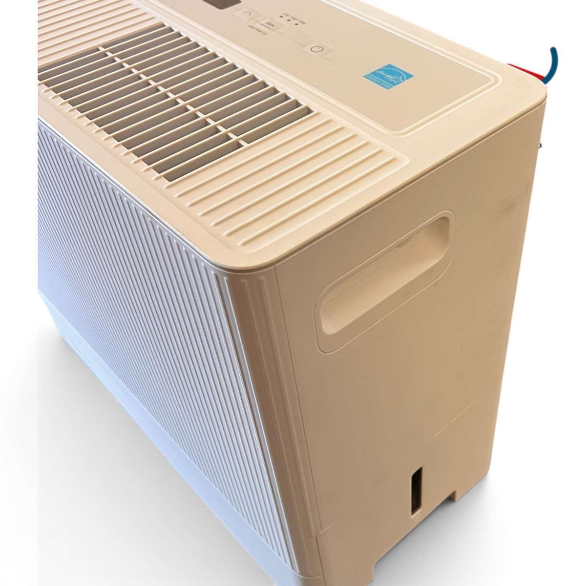 WT Outlets Insignia 35-pint portable dehumidifier in white with a low-profile design and top control panel.