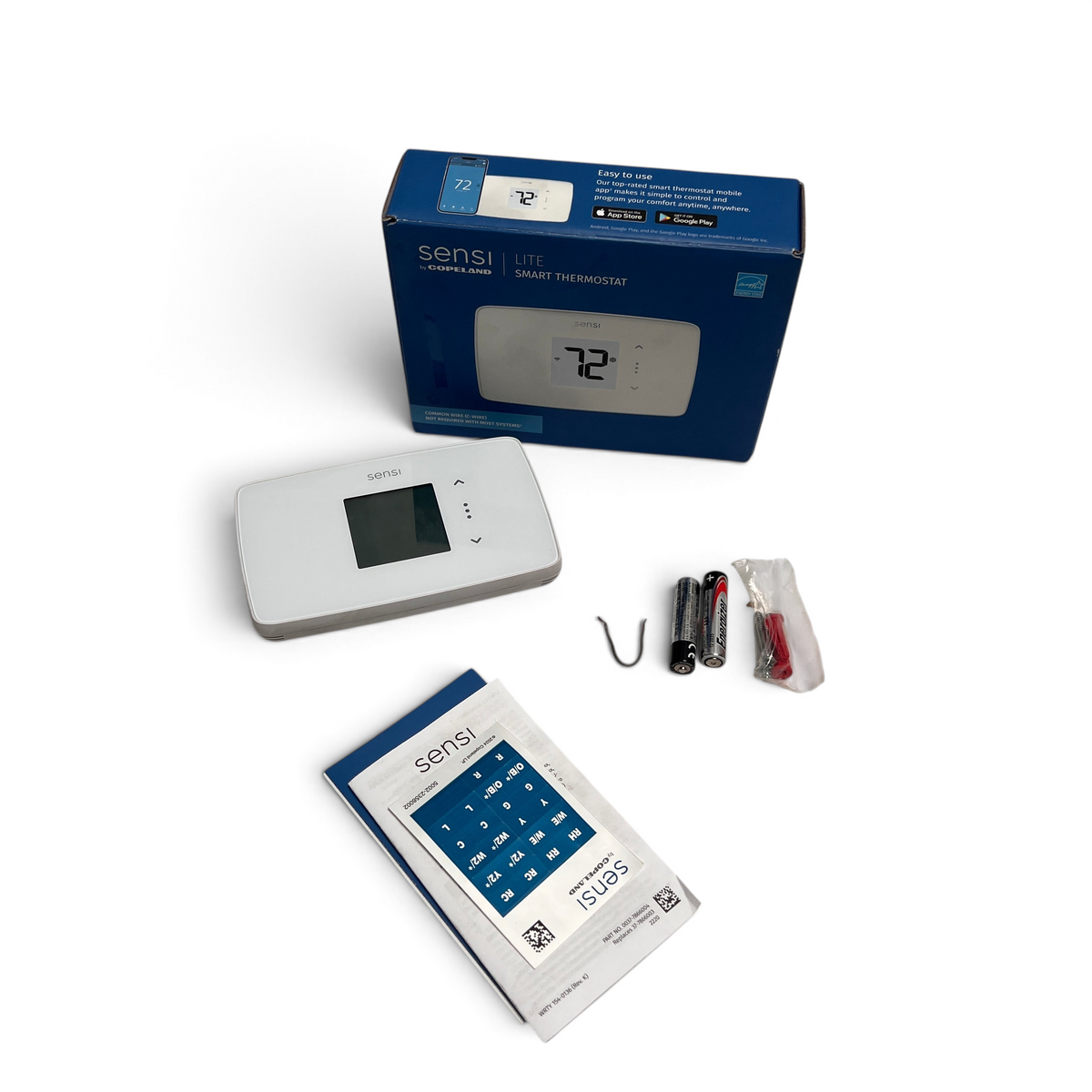 WT Outlets Sensi Lite ST25 smart Wi-Fi thermostat with original packaging, batteries, jumper wire, and manual.