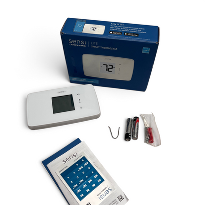 WT Outlets Sensi Lite ST25 smart Wi-Fi thermostat with original box, batteries, jumper wire, and documentation.