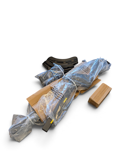 WT Outlets Ozark Trail premium steel 2-bike hitch rack in open box packaging with protective plastic wrapping