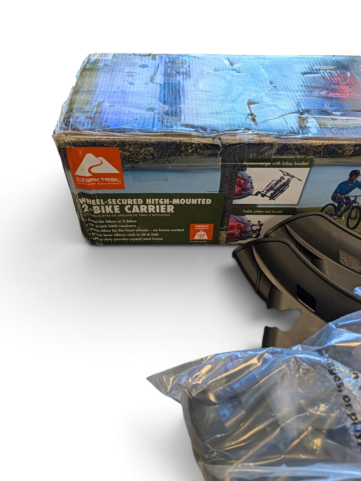WT Outlets Ozark Trail premium steel 2-bike hitch rack in original packaging with 132lb capacity for 2-inch receiver