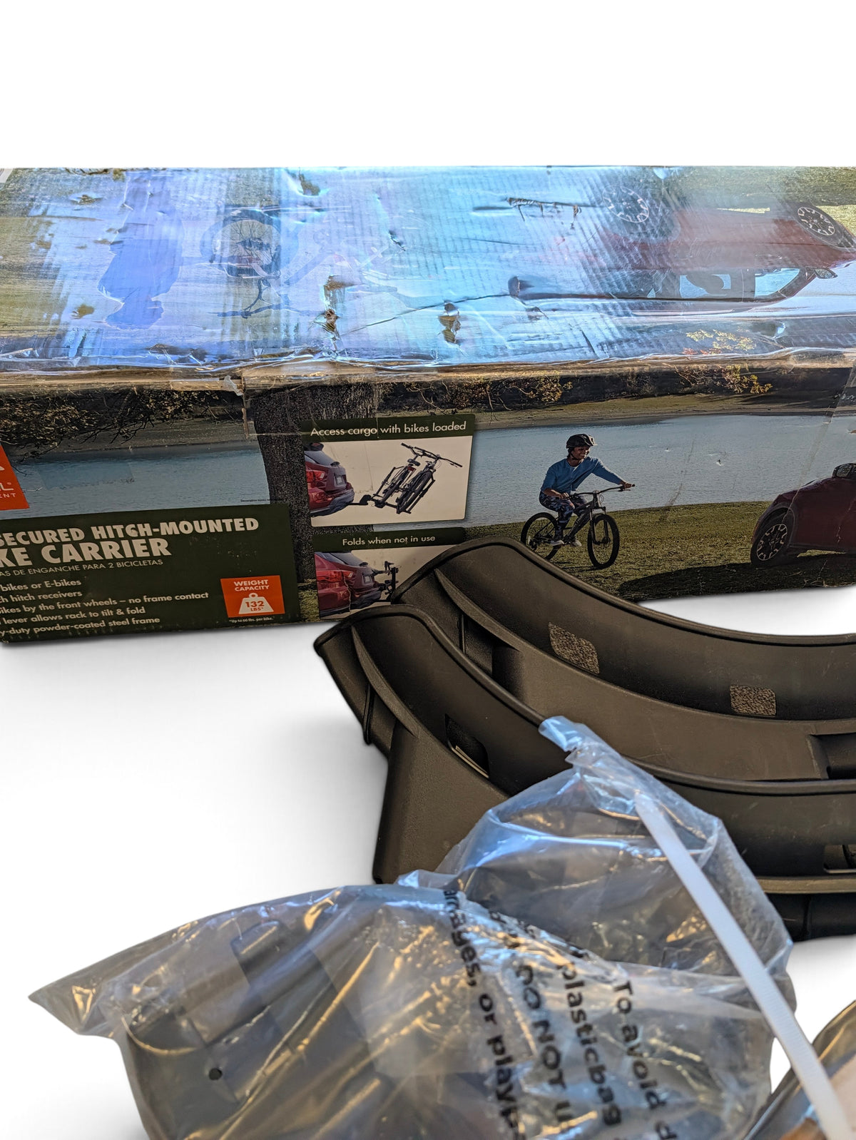 WT Outlets Ozark Trail premium steel bike rack in box with 132lb capacity for 2-inch hitch receiver