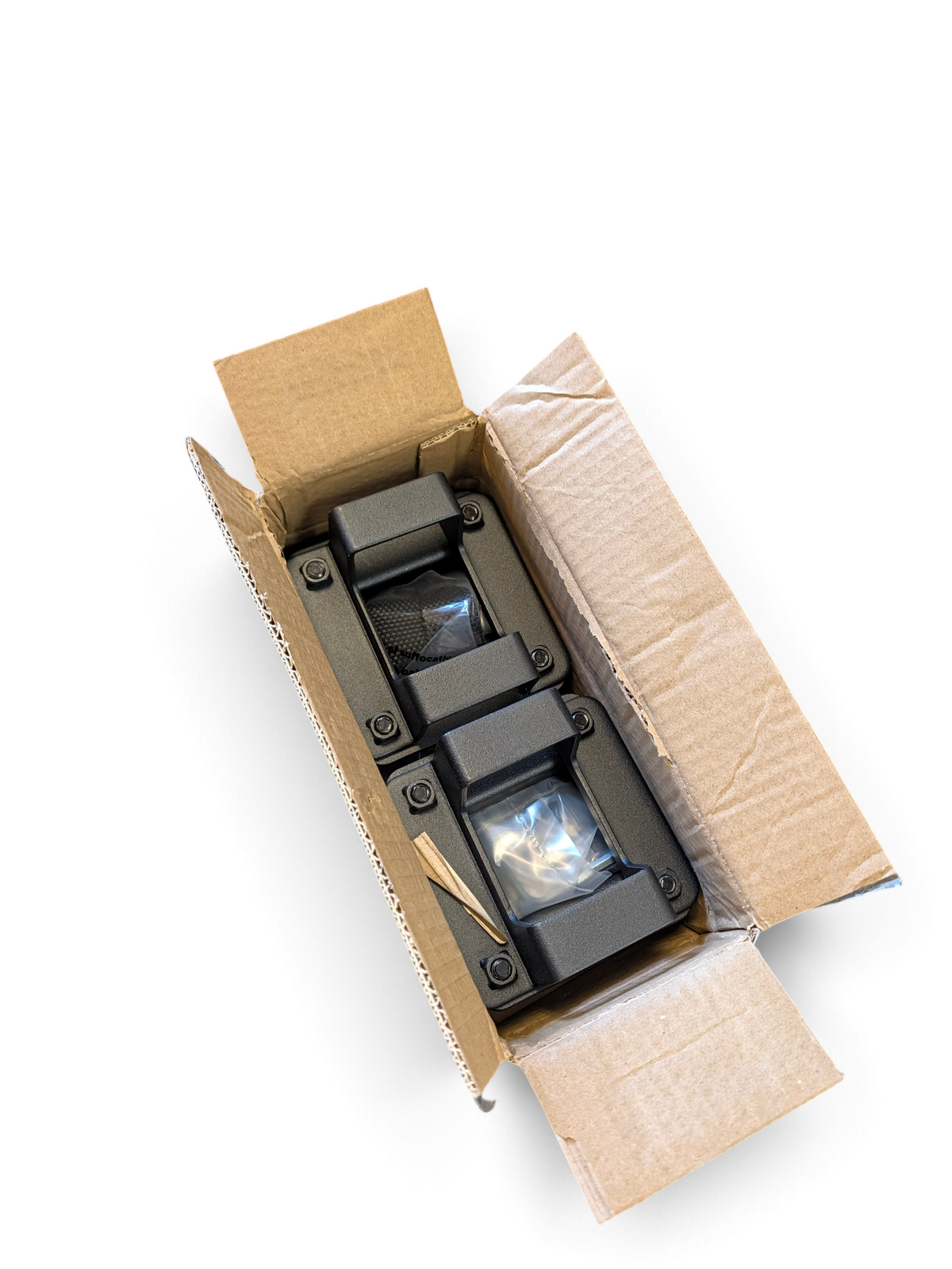 WT Outlets Ozark Trail premium steel bike rack components inside an open cardboard box