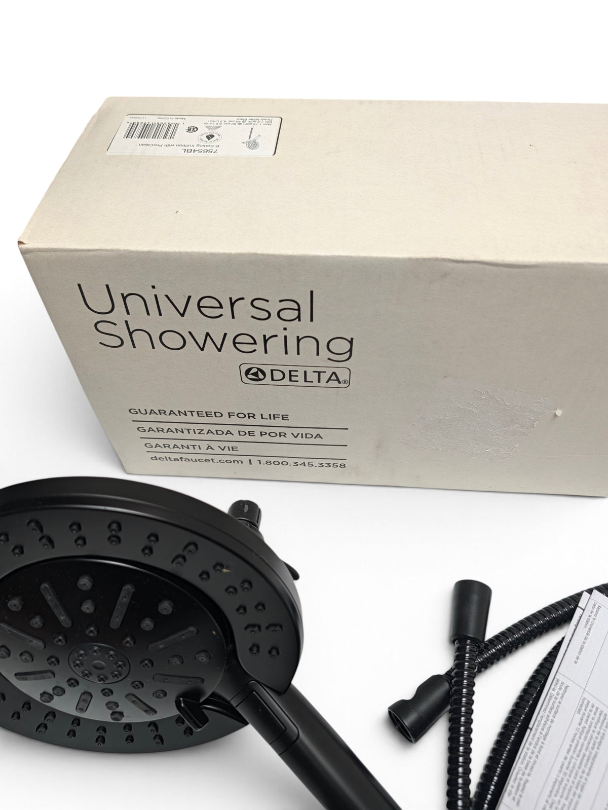 WT Outlets Delta In2ition 2-in-1 matte black shower head and handheld unit with packaging box and instructions